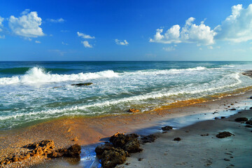 Theme: Seascape cloudy sky big waves and stones