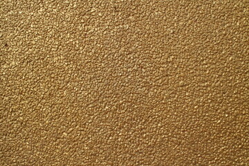 golden texxture on cenect wall background