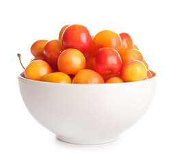 Bowl with sweet yellow cherries on white background