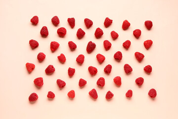Many fresh raspberries on pink background