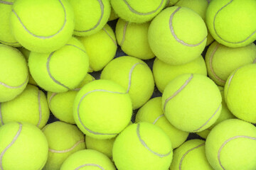 CLOSEUP OF MANY TENNIS OR PADEL BALLS BACKGROUND. BETTING SPORTS IN BETTING SHOPS.