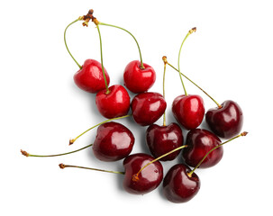 Obraz na płótnie Canvas Many red sweet cherries on white background