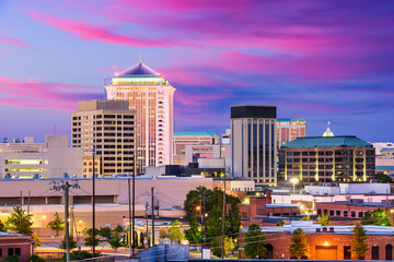 Montgomery, Alabama, USA downtown skyline at night.