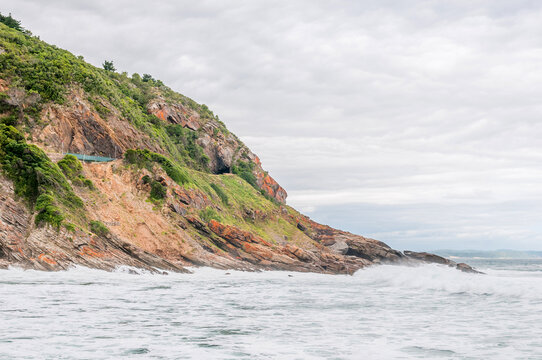 View at Victoria Bay. The train tunnel in the railroad between George and Knysna is visible