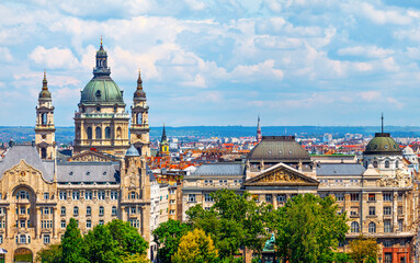 Fototapeta na wymiar Urban landscape panorama with old buildings and domes of opera buildings in Budapest, Hungary