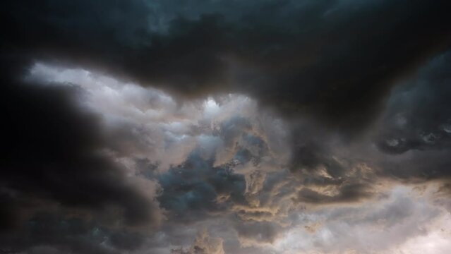 Looking Up Into Powerful Spinning Storm Clouds With Flashing Lightning