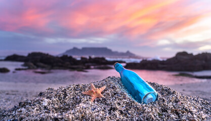 Fototapeta na wymiar Captivating Beach Scene with Message-in-a-Bottle - Surreal Serenity, Hidden Messages, Coastal Beauty. Table Mountain, Cape Town, South Africa