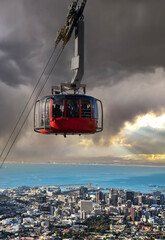 Table Mountain Cable Car dramatic sky - Cape Town, South Africa - Breathtaking Rides, Panoramic Scenery, Aerial Adventures