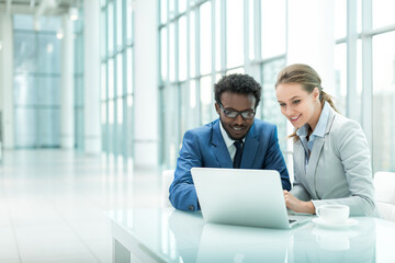 Business people with laptop in office