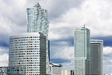 Modern skyscrapers in business district in Warsaw at sunny day.