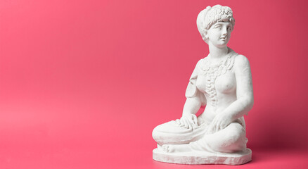 beautiful plaster sculpture on pink background in high resolution