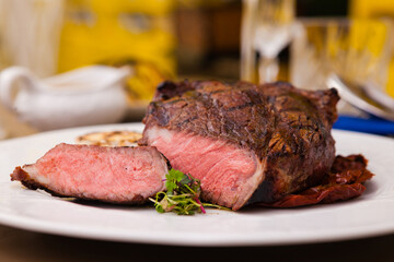 Entrecote with grilled garlic served on a plate