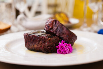 Filet mignon served on a plate in restaurant