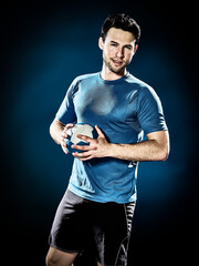 one caucasian man handball player isolated on black background