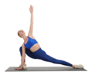 Yoga workout. Young woman stretching on white background