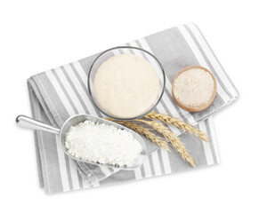 Leaven, flour and ears of wheat isolated on white, top view