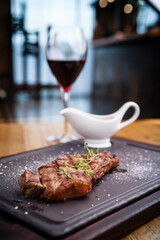 New York steak with glass of red wine