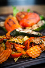 Grilled vegetables, baked in coal oven served on a warm plate