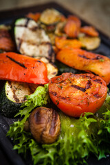 Grilled vegetables, baked in coal oven served on a warm plate