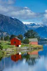Fototapeta na wymiar Beautiful Nature Norway natural landscape with red fishing houses.