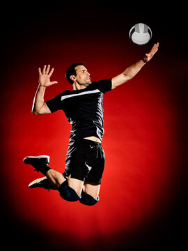 one caucasian volley ball player man isolated on colorful black background
