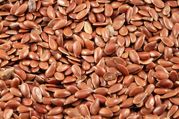 A super macro image of brown flax seeds