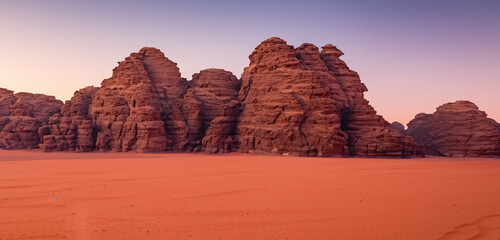 beautiful rock mountains in the middle of the desert at a beautiful sunset in high resolution and sharpness