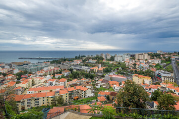 Fototapeta na wymiar Funchal cityscape view from fortress on the hill. Madeira island, Portugal.