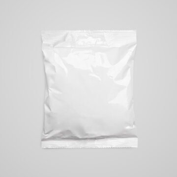 Top view of blank plastic pouch food packaging on gray with clipping path