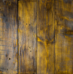 Old hazel wood panels with cracks, scratches, swirls, notch and chips. Background with space for...