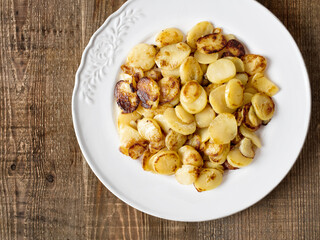 close up of rustic german bratkartofflen fried potatoes