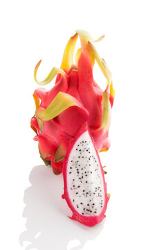 Delicious ripe dragon fruit isolated on white background. Tropical fruit, pitaya concept. Healthy eating.