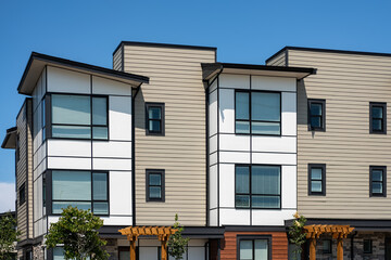 New residential townhouses. Modern apartment buildings in Canada. Modern complex of apartment buildings. Top of a house
