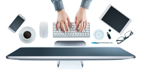 Business woman working at office desk and typing on a keyboard, hands close up, top view