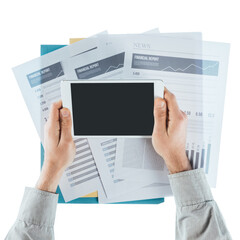 Businessman working at office desk with financial reports and using a touch screen tablet, hands...