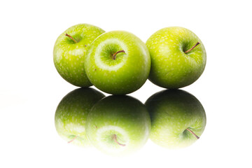 Juicy shiny green apples on white background, healthy eating.