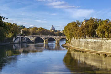 view of the Tiber river with bridge in Rome, Italy