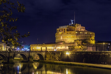 Fototapeta na wymiar view of Castle of the Holy Angel with Tiber river, Rome. Evening