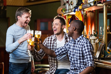 Expression man with a beer indoors