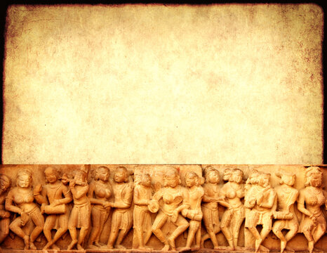 Grunge background with paper texture and carving famous erotic woman sculptures at temple in Khajuraho, India