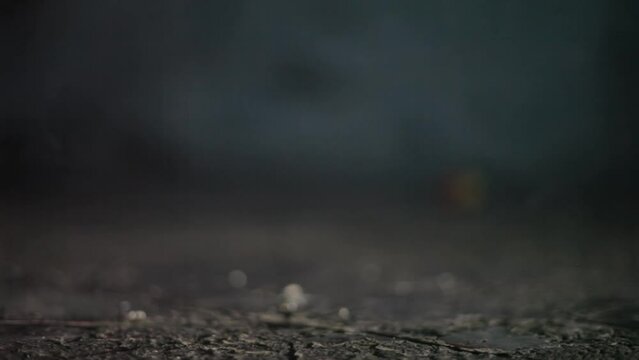 SHOT OF DEBRIS ON THE FLOOR WITH SMOKE AND FOG COMING FROM BURNING WOOD. CINEMATIC SHOT OF FALLEN BUILDING MYSTERIOUS BG. HD VIDEO.
