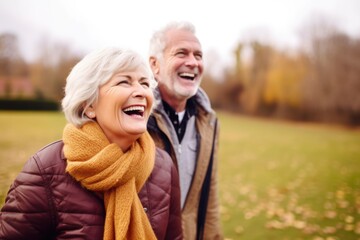 Fototapeta premium Happy Senior couple having fun together at the park