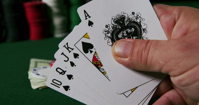 Poker Royal Straight Flush in player's hands