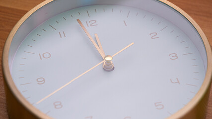 Close up White cock face the beginning of time 11.59  am or pm. 