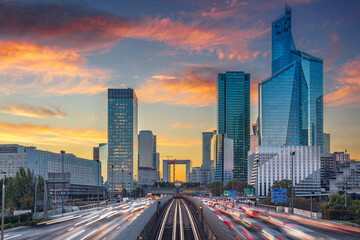 Fototapeta premium Image of office buildings in modern part of Paris- La Defense during beautiful sunset.