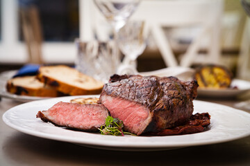 Entrecote with grilled garlic served on a plate