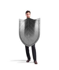 Businessman with shields. concept of protection and defense in the business world