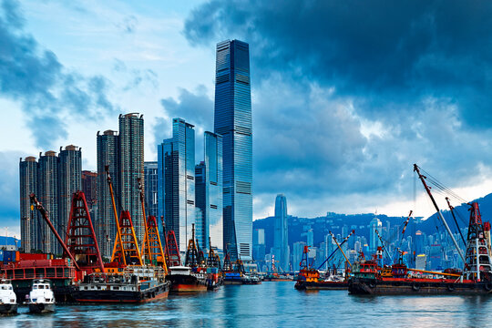 International Commerce Center ICC Building Kowloon Hong Kong Harbor with cargo ship