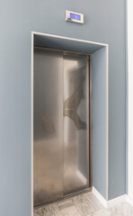 Passenger elevator metal door