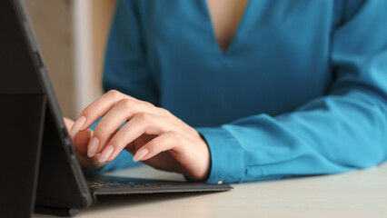Computer work. Internet business. Marketing expert. Woman specialist professional hands typing on modern laptop keyboard at office workplace.